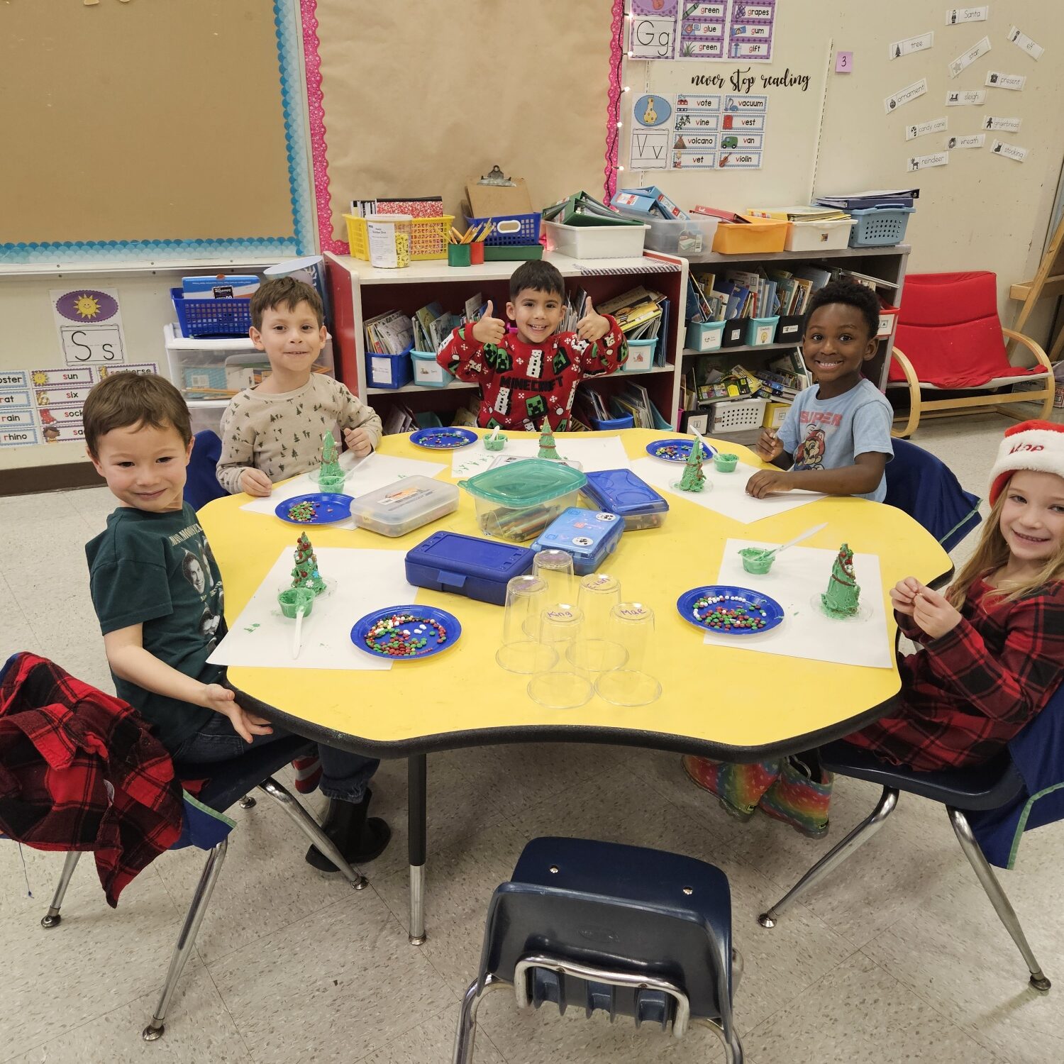 Horatio B. Hackett School students sitting around a table